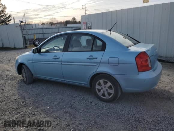 2010 Hyundai Accent GLS z VIN KMHCN4AC5AU475664, wystawiony jako Copart lot #80907054 z przebiegiem 131 087 mil mil oraz Szkoda całkowita • Salvage title. Historia ofert i sprzedaży dostępna na DreamBid. Obrazek 2.