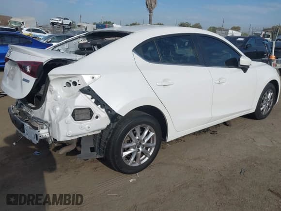 ✅ 2016 Mazda 3 i Grand Touring • VIN: JM1BM1X73G1346876 • Lot: 40283164. Listed on IAAI with 102,264 mi. Free auction sales archive from the USA and detailed vehicle history report at DreamBid. Image 4.