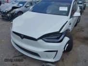 ✅ 2023 Tesla Model X Plaid • VIN: 7SAXCBE65PF418602 • Lot: 42956757. Listed on IAAI with 44,161 mi. Free auction sales archive from the USA and detailed vehicle history report at DreamBid. Image 6.