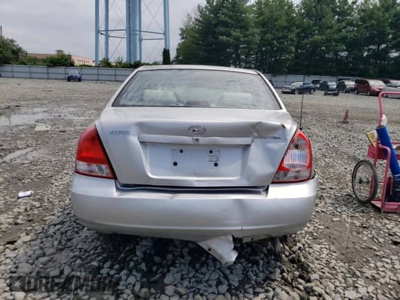 2003 Hyundai Elantra GLS with VIN KMHDN45D73U625235, listed as a Copart auction lot 62965683 with 153,845 mi miles and Salvage title. Bid and sale history available at DreamBid. Image 6.