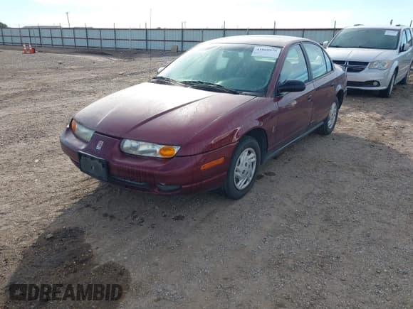 ✅ 2002 Saturn SL • VIN: 1G8ZF52822Z165725 • Lot: 43860858. Listed on IAAI with 191,469 mi. Free auction sales archive from the USA and detailed vehicle history report at DreamBid. Image 2.