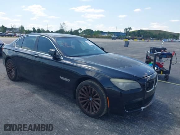 ✅ 2012 BMW 7 Series 740i • VIN: WBAKA4C50CDS99293 • Lot: 42208510. Listed on IAAI with 127,631 mi. Free auction sales archive from the USA and detailed vehicle history report at DreamBid. Image 1.