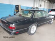 ✅ 1997 Jaguar XJ Vanden Plas • VIN: SAJKX6243VC800080 • Lot: 42190859. Listed on IAAI with 192,979 mi. Free auction sales archive from the USA and detailed vehicle history report at DreamBid. Image 4.