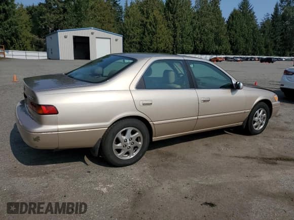 ✅ 1997 Toyota Camry LE • VIN: JT2BF22K4V0074975 • Lot: 83843615. Wystawiony na Copart z przebiegiem 254 354 mil. Bezpłatny archiwum sprzedaży aukcyjnych z USA i szczegółowy raport historii pojazdu na DreamBid. Zdjęcie 3.