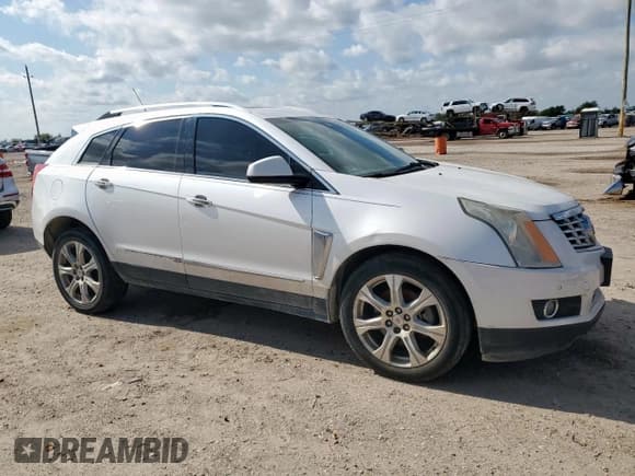 ✅ 2015 Cadillac SRX Performance Collection • VIN: 3GYFNCE39FS607266 • Lot: 90239145. Listed on Copart with 124,658 mi. Free auction sales archive from the USA and detailed vehicle history report at DreamBid. Image 4.