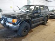 ✅ 1997 Toyota Land Cruiser • VIN: JT3HJ85J1V0184599 • Lot: 41571386. Listed on IAAI with 305,201 mi. Free auction sales archive from the USA and detailed vehicle history report at DreamBid. Image 2.