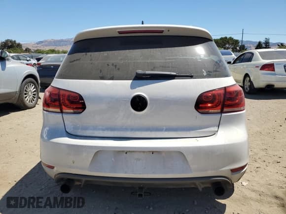 ✅ 2012 Volkswagen Golf GTI w/Conv & Sunroof • VIN: WVWEV7AJXCW009863 • Lot: 67143665. Listed on Copart with 123,549 mi. Free auction sales archive from the USA and detailed vehicle history report at DreamBid. Image 6.