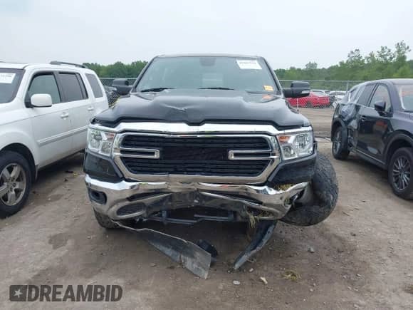 2019 Ram 1500 Big Horn z VIN 1C6SRFFT2KN911978, wystawiony jako IAAI lot #42483116 z przebiegiem 123 639 mil mil oraz . Historia ofert i sprzedaży dostępna na DreamBid. Obrazek 6.