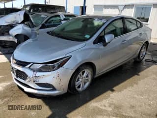 ✅ 2018 Chevrolet Cruze LT • VIN: 1G1BE5SM8J7189487 • Lot: 62569483. Listed on Copart with 126,588 mi. Free auction sales archive from the USA and detailed vehicle history report at DreamBid. Image 1.