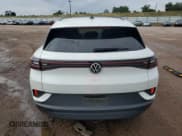 ✅ 2023 Volkswagen ID.4 Pro S • VIN: 1V2WNPE87PC038111 • Лот: 70380155. Опубликован ранее на Copart с пробегом 13 270 миль. Бесплатный доступ к архиву аукционных продаж из США и подробный отчёт об истории автомобиля на DreamBid. Изображение 6.