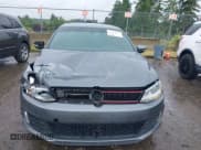 ✅ 2014 Volkswagen Jetta GLI • VIN: 3VW4T7AJ2EM208598 • Lot: 42381855. Listed on IAAI with 82,761 mi. Free auction sales archive from the USA and detailed vehicle history report at DreamBid. Image 12.