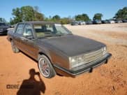 ✅ 1985 Chevrolet Celebrity • VIN: 2G1AW19R2F1120933 • Лот: 75407474. Опубликован ранее на Copart с пробегом 78 007 миль. Бесплатный доступ к архиву аукционных продаж из США и подробный отчёт об истории автомобиля на DreamBid. Изображение 14.