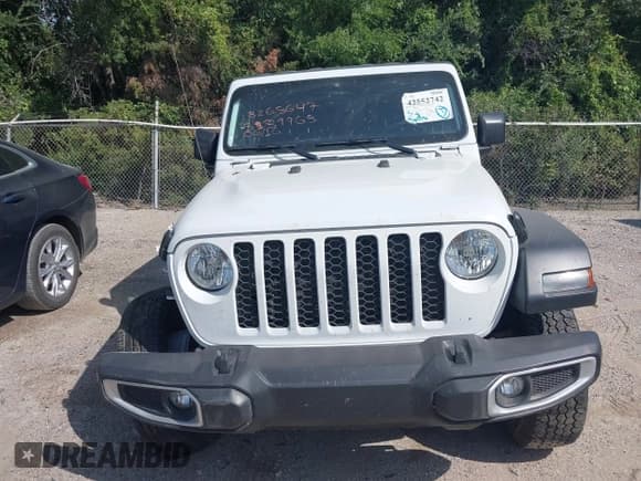 ✅ 2023 Jeep Gladiator Sport S • VIN: 1C6HJTAGXPL539965 • Лот: 42552742. Опубликован ранее на IAAI с пробегом 57 918 миль. Бесплатный доступ к архиву аукционных продаж из США и подробный отчёт об истории автомобиля на DreamBid. Изображение 12.