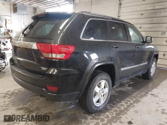 ✅ 2012 Jeep Grand Cherokee Laredo • VIN: 1C4RJFAG1CC220043 • Lot: 43512464. Listed on IAAI with 105,107 mi. Free auction sales archive from the USA and detailed vehicle history report at DreamBid. Image 4.