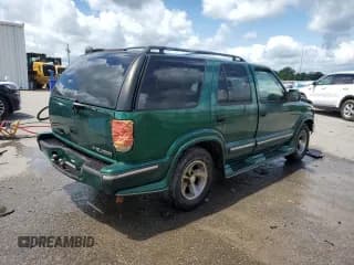 ✅ 1999 Chevrolet Blazer LT • VIN: 1GNCS13W3X2134276 • Lot: 60829885. Wystawiony na Copart z przebiegiem 237 269 mil. Bezpłatny archiwum sprzedaży aukcyjnych z USA i szczegółowy raport historii pojazdu na DreamBid. Zdjęcie 3.