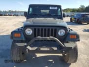 ✅ 2004 Jeep Wrangler Sport • VIN: 1J4FA49S14P735502 • Lot: 70548875. Listed on Copart with Not provided. Free auction sales archive from the USA and detailed vehicle history report at DreamBid. Image 5.