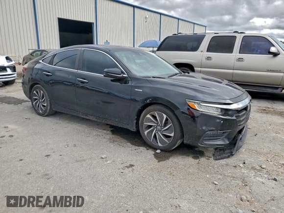 ✅ 2019 Honda Insight Touring • VIN: 19XZE4F99KE019761 • Лот: 94521535. Опубликован ранее на Copart с пробегом 101 077 миль. Бесплатный доступ к архиву аукционных продаж из США и подробный отчёт об истории автомобиля на DreamBid. Изображение 4.