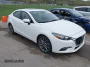 ✅ 2018 Mazda 3 Touring • VIN: 3MZBN1V32JM190611 • Lot: 42032844. Wystawiony na IAAI z przebiegiem 63 493 mil. Bezpłatny archiwum sprzedaży aukcyjnych z USA i szczegółowy raport historii pojazdu na DreamBid. Zdjęcie 1.