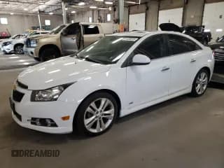✅ 2014 Chevrolet Cruze LTZ • VIN: 1G1PG5SB4E7354584 • Lot: 91495615. Listed on Copart with 118,175 mi. Free auction sales archive from the USA and detailed vehicle history report at DreamBid. Image 1.
