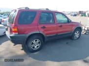 ✅ 2004 Ford Escape XLT • VIN: 1FMYU93114KB38538 • Lot: 42678317. Listed on IAAI with 180,106 mi. Free auction sales archive from the USA and detailed vehicle history report at DreamBid. Image 4.