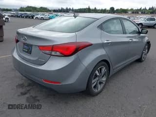 ✅ 2014 Hyundai Elantra SE • VIN: KMHDH4AEXEU105152 • Lot: 42531198. Listed on IAAI with 120,373 mi. Free auction sales archive from the USA and detailed vehicle history report at DreamBid. Image 4.