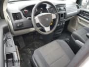 ✅ 2009 Dodge Grand Caravan Cargo • VIN: 2D4HN11E79R672082 • Lot: 80981334. Listed on Copart with 115,681 mi. Free auction sales archive from the USA and detailed vehicle history report at DreamBid. Image 8.