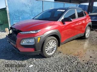 ✅ 2019 Hyundai Kona SEL • VIN: KM8K22AA3KU219029 • Lot: 88687755. Wystawiony na Copart z przebiegiem 74 125 mil mil. Skorzystaj z bezpłatnego archiwum sprzedaży aukcyjnych z USA i zobacz szczegółowy raport historii pojazdu na DreamBid. Zdjęcie 1.