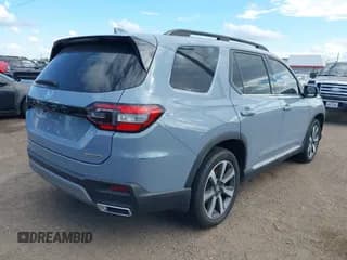 ✅ 2023 Honda Pilot Touring • VIN: 5FNYG2H7XPB014642 • Lot: 43368502. Wystawiony na IAAI z przebiegiem Nie podano. Bezpłatny archiwum sprzedaży aukcyjnych z USA i szczegółowy raport historii pojazdu na DreamBid. Zdjęcie 4.