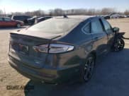✅ 2020 Ford Fusion Titanium • VIN: 3FA6P0D97LR117454 • Lot: 38784683. Wystawiony na Copart z przebiegiem Nie podano. Bezpłatny archiwum sprzedaży aukcyjnych z USA i szczegółowy raport historii pojazdu na DreamBid. Zdjęcie 3.