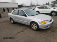 ✅ 1999 Mazda Protege ES • VIN: JM1BJ2218X0153260 • Lot: 78893394. Wystawiony na Copart z przebiegiem 196 034 mil. Bezpłatny archiwum sprzedaży aukcyjnych z USA i szczegółowy raport historii pojazdu na DreamBid. Zdjęcie 4.