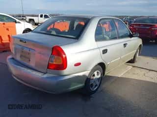 2000 Hyundai Accent z VIN KMHCG45G3YU034438, wystawiony jako IAAI lot #41356583 z przebiegiem 57 283 mil mil oraz . Historia ofert i sprzedaży dostępna na DreamBid. Obrazek 4.
