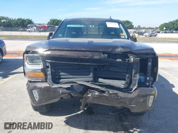 ✅ 2018 Chevrolet Silverado 1500 LT • VIN: 1GCVKREC1JZ205587 • Лот: 43683089. Опубликован ранее на IAAI с пробегом 99 522 миль. Бесплатный доступ к архиву аукционных продаж из США и подробный отчёт об истории автомобиля на DreamBid. Изображение 6.