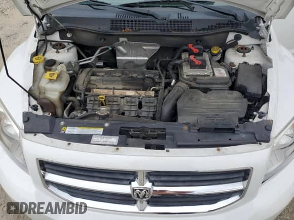 2012 Dodge Caliber SXT Plus with VIN 1C3CDWEA8CD506425, listed as a Copart auction lot 66889665 with 80,772 mi miles and Clean title. Bid and sale history available at DreamBid. Image 12.