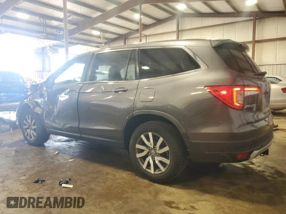 ✅ 2019 Honda Pilot EX-L • VIN: 5FNYF6H58KB100677 • Lot: 61347595. Listed on Copart with 59,987 mi. Free auction sales archive from the USA and detailed vehicle history report at DreamBid. Image 2.