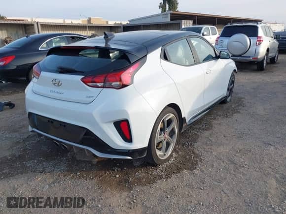 2020 Hyundai Veloster Turbo R-Spec z VIN KMHTH6AB4LU024626, wystawiony jako IAAI lot #41231161 z przebiegiem 54 849 mil mil oraz . Historia ofert i sprzedaży dostępna na DreamBid. Obrazek 4.