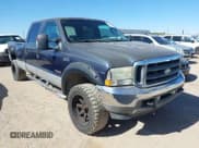 ✅ 2003 Ford F-350 XL • VIN: 1FTSW31P53ED22922 • Lot: 42086364. Listed on IAAI with 310,073 mi. Free auction sales archive from the USA and detailed vehicle history report at DreamBid. Image 1.