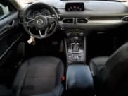 ✅ 2018 Mazda CX-5 Touring • VIN: JM3KFACM6J1448886 • Lot: 91935085. Wystawiony na Copart z przebiegiem 102 177 mil. Bezpłatny archiwum sprzedaży aukcyjnych z USA i szczegółowy raport historii pojazdu na DreamBid. Zdjęcie 8.