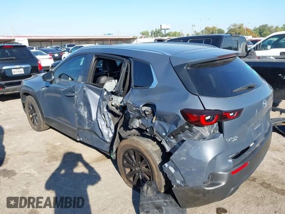 ✅ 2024 Mazda CX-50 S Preferred • VIN: 7MMVABBM2RN217211 • Lot: 43410951. Listed on IAAI with 14,009 mi. Free auction sales archive from the USA and detailed vehicle history report at DreamBid. Image 3.