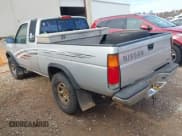 ✅ 1994 Nissan Frontier SE • VIN: 1N6HD16Y6RC362448 • Lot: 43812811. Listed on IAAI with 225,889 mi. Free auction sales archive from the USA and detailed vehicle history report at DreamBid. Image 3.