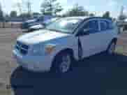 2012 Dodge Caliber SXT with VIN 1C3CDWDA4CD536636, listed as a IAAI auction lot 43225609 with 69,066 mi miles and . Bid and sale history available at DreamBid. Image 2.