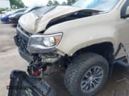 ✅ 2022 Chevrolet Colorado 4WD ZR2 • VIN: 1GCGTEEN7N1271260 • Lot: 42320443. Listed on IAAI with 11,426 mi. Free auction sales archive from the USA and detailed vehicle history report at DreamBid. Image 17.