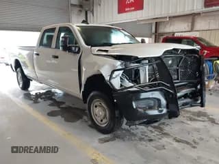 ✅ 2023 Ram 2500 Tradesman • VIN: 3C6UR5HJ0PG610057 • Lot: 42385008. Listed on IAAI with 21,105 mi. Free auction sales archive from the USA and detailed vehicle history report at DreamBid. Image 1.