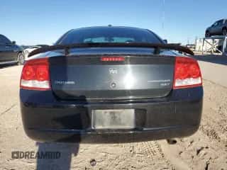 2009 Dodge Charger SXT с VIN 2B3KA33V29H545254, выставлен на аукционе Copart как лот 79246754 с пробегом 166 981 миль миль и Списание • Salvage title. История ставок и продаж доступна на DreamBid. Изображение 6.