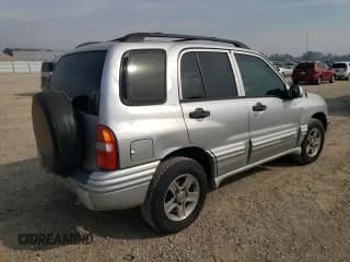 ✅ 2002 Chevrolet Tracker LT • VIN: 2CNBE634926922512 • Лот: 75759264. Опубликован ранее на Copart с пробегом 201 890 миль. Бесплатный доступ к архиву аукционных продаж из США и подробный отчёт об истории автомобиля на DreamBid. Изображение 3.