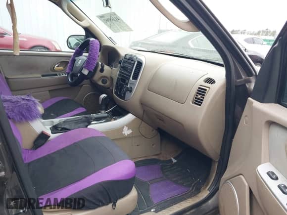 2005 Mercury Mariner Luxury z VIN 4M2YU56195DJ14917, wystawiony jako IAAI lot #41538962 z przebiegiem 210 486 mil mil oraz . Historia ofert i sprzedaży dostępna na DreamBid. Obrazek 5.