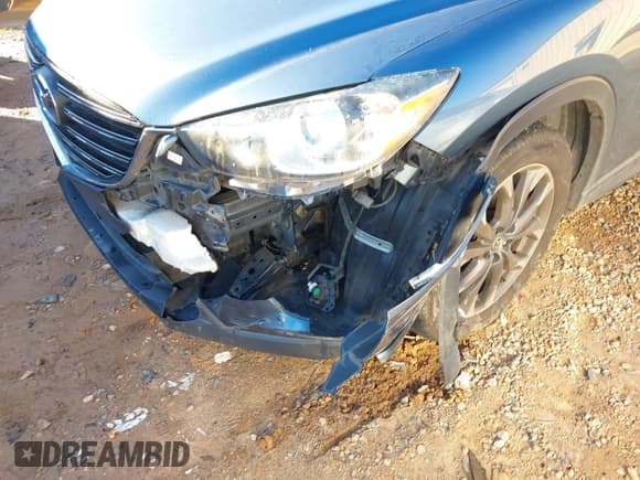 ✅ 2016 Mazda CX-5 Grand Touring • VIN: JM3KE2DY6G0769349 • Lot: 43593752. Wystawiony na IAAI z przebiegiem 80 588 mil. Bezpłatny archiwum sprzedaży aukcyjnych z USA i szczegółowy raport historii pojazdu na DreamBid. Zdjęcie 6.