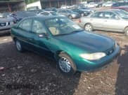 ✅ 1999 Ford Escort SE • VIN: 1FAFP13P2XW264113 • Lot: 42648045. Listed on IAAI with 72,253 mi. Free auction sales archive from the USA and detailed vehicle history report at DreamBid. Image 1.