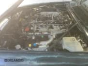 ✅ 1991 Jaguar XJS • VIN: SAJTW4841MC177317 • Lot: 70994365. Listed on Copart with 114,102 mi. Free auction sales archive from the USA and detailed vehicle history report at DreamBid. Image 11.