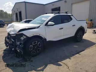 2023 Hyundai Santa Cruz SEL z VIN 5NTJC4AE0PH076202, wystawiony jako Copart lot #81050525 z przebiegiem 34 465 mil mil oraz Szkoda całkowita • Salvage title. Historia ofert i sprzedaży dostępna na DreamBid. Obrazek 1.