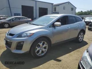 ✅ 2011 Mazda CX-7 S Grand Touring • VIN: JM3ER4DL6B0385842 • Лот: 68100605. Опубликован ранее на Copart с пробегом 79 942 миль. Бесплатный доступ к архиву аукционных продаж из США и подробный отчёт об истории автомобиля на DreamBid. Изображение 1.